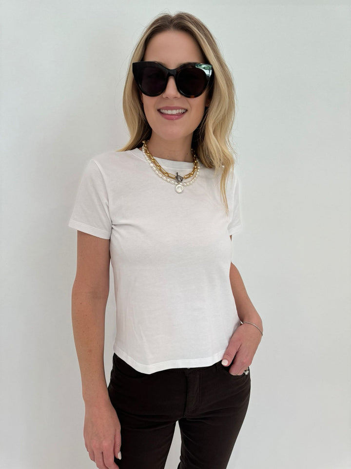 Frame Side Detail Button Tee in White, accessorized with BK Jewelry 16" Oval Rolo Necklace With Disc Pearl in Gold/White layered with Small Pearl 17" Necklace With Swivel Clasp in White