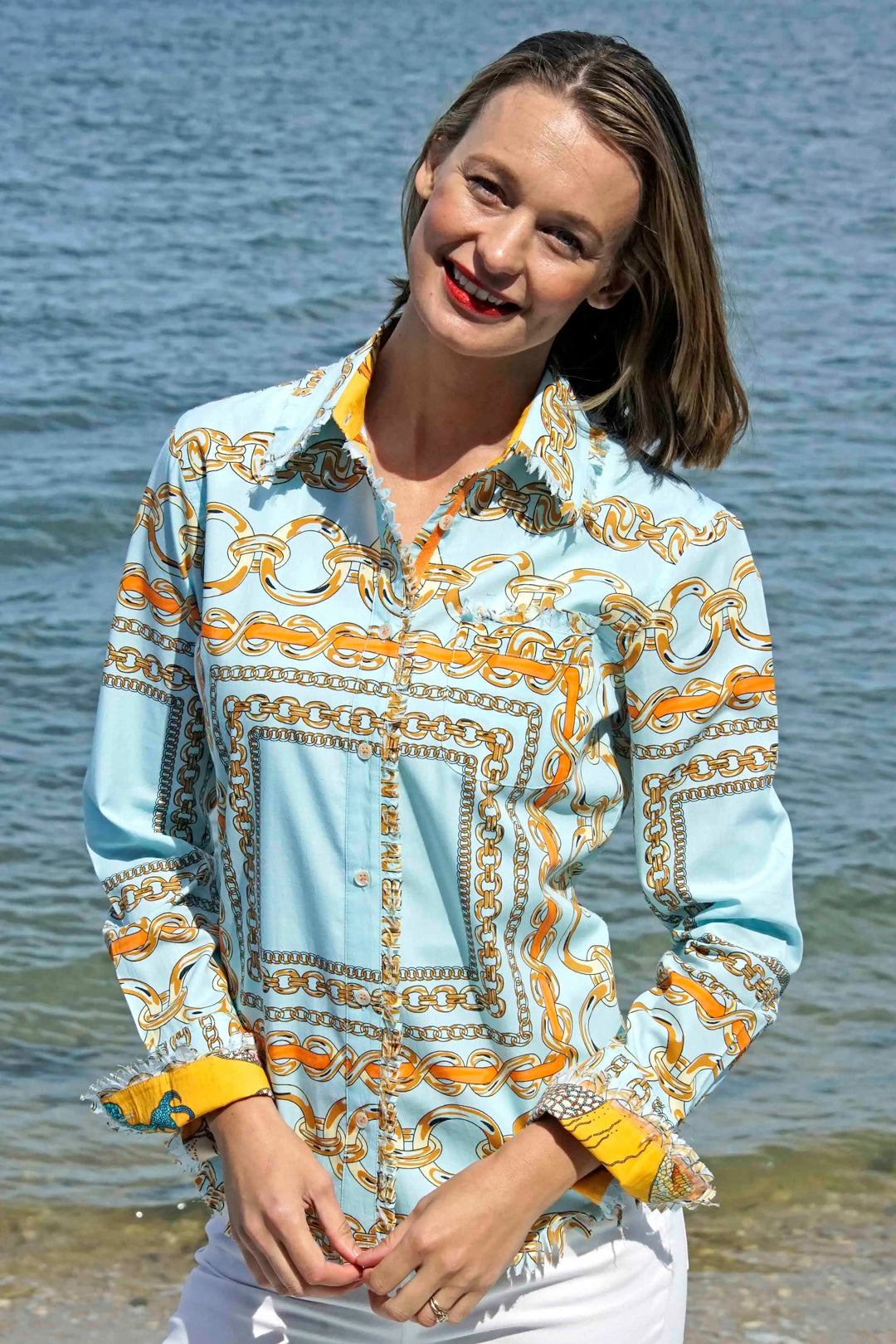 Dizzy-Lizzie Cape Cod Frayed Shirt - Aqua With Orange Links available at Barbara Katz