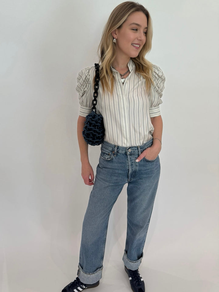 Frame Gillian Top in Cream Multi paired with Agolde Fran Jeans and Alienina Mina Small Bag in Blue Waxed + Black Chain