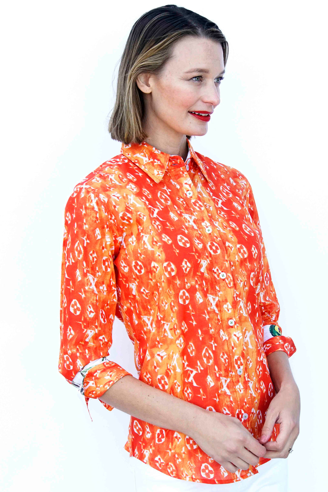 Dizzy-Lizzie 3/4 Sleeve Orange And White "Not Really Louis" Print available at Barbara Katz