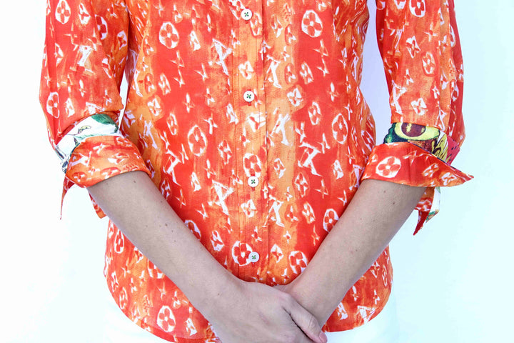 Dizzy-Lizzie 3/4 Sleeve Orange And White "Not Really Louis" Print available at Barbara Katz