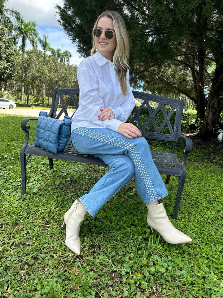 Ba&sh Aply Long Sleeve Top in Blanc paired with Frame Atelier Le Jane Crop Denim in Daylight Pearl, Lizzie Fortunato Silver Mine Earrings, Le Specs Neptune Deux Sunnies, Vee Collective Porter Messenger Bag in Denim - all available at Barbara Katz