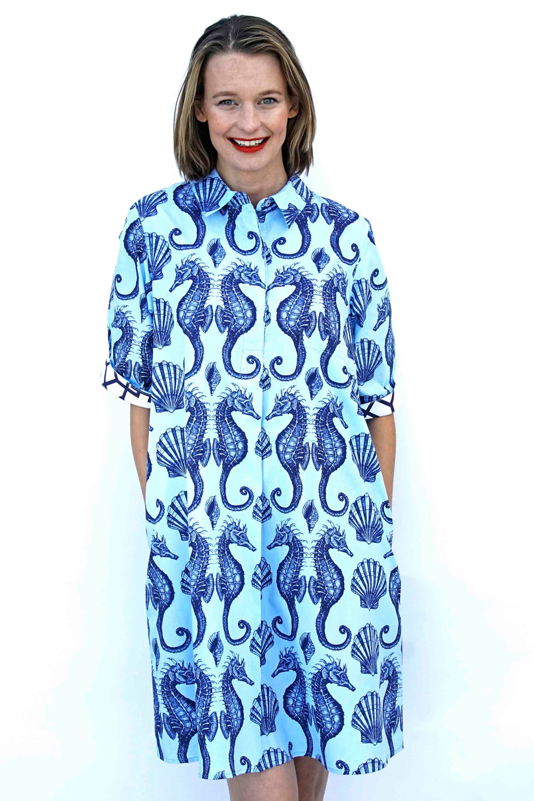 Dizzy-Lizzie Monterey Dress - Ocean Blue Ground With Seahorses available at Barbara Katz