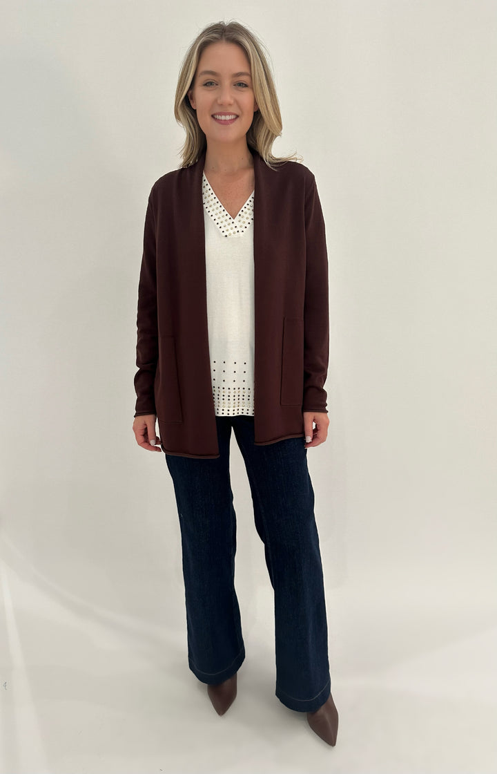 Leo & Ugo V-Neck Rhinestone Grommet Long Sleeve Top in White, layered with BK Olivia Long Open Cardigan in Espresso, paired with MAC Indigo Dark Dream Wide Jeans - all available at Barbara Katz