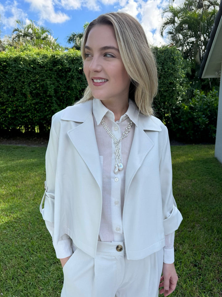 Marella Monochrome Wool White Vento Jacket with Orzo Sheer Blouse underneath, paired with Alisso Cargo Pants, Lizzie Fortunato Edith Lariat Necklace - all available at Barbara Katz 