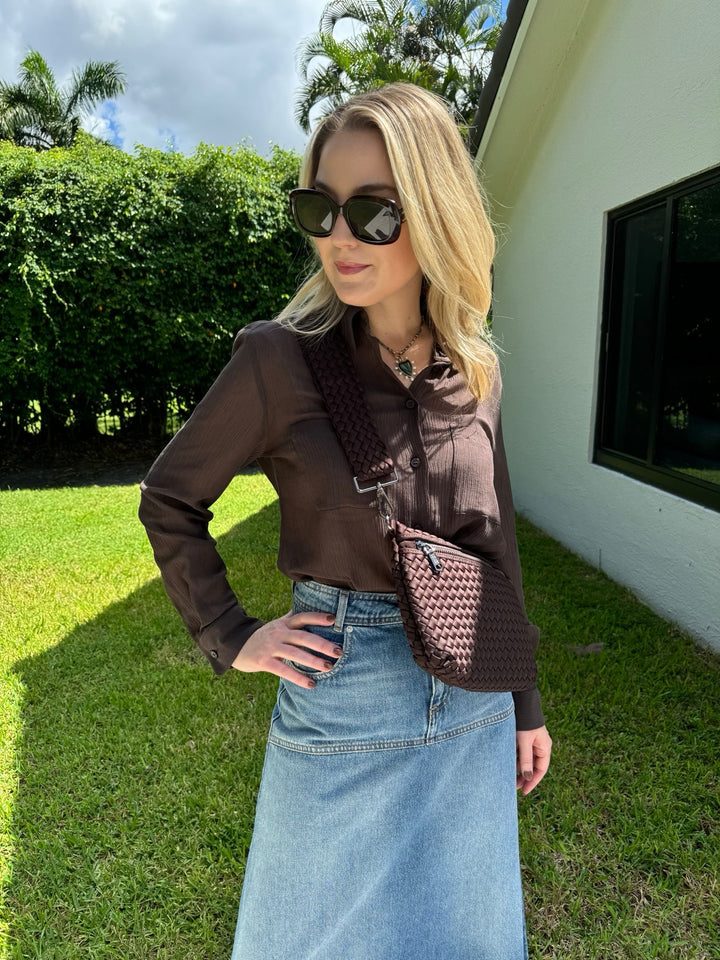 Marella Monochrome Orzo Sheer Blouse in Dark Brown paired with Ba&sh Valentia Denim Midi Skirt in Light Blue, Sol and Selene Ethereal Woven Neoprene Crossbody Bag in Chocolate available at Barbara Katz