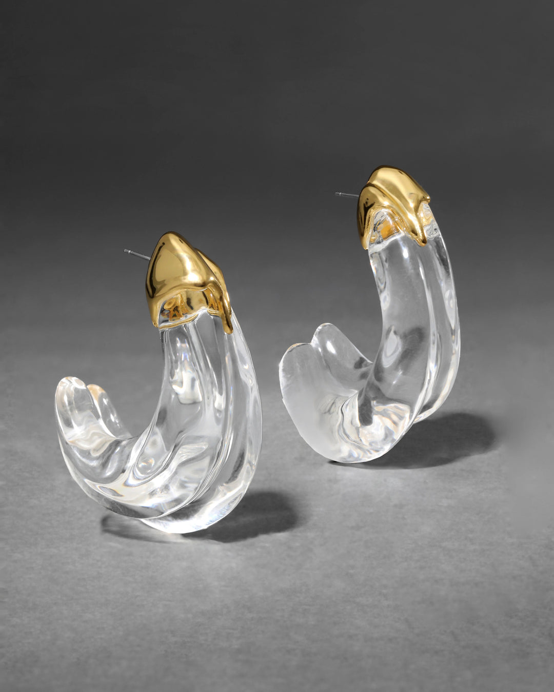 Alexis Bittar Clear Liquid Lucite Large Wave Hoop Earrings available at Barbara Katz