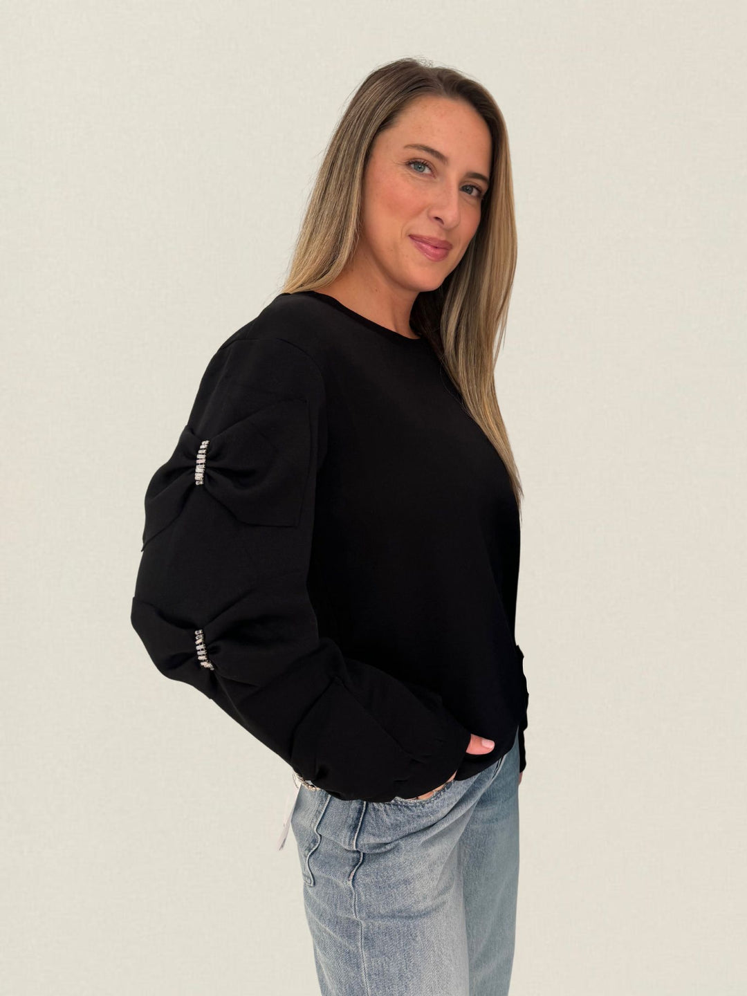 Leo & Ugo Bow Sleeve Sweatshirt in Black available at Barbara Katz