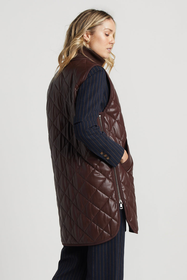 Adroit Atelier Destiny Sleeveless Quilted Vest With Side Zipper Detail in Chocolate available at Barbara Katz