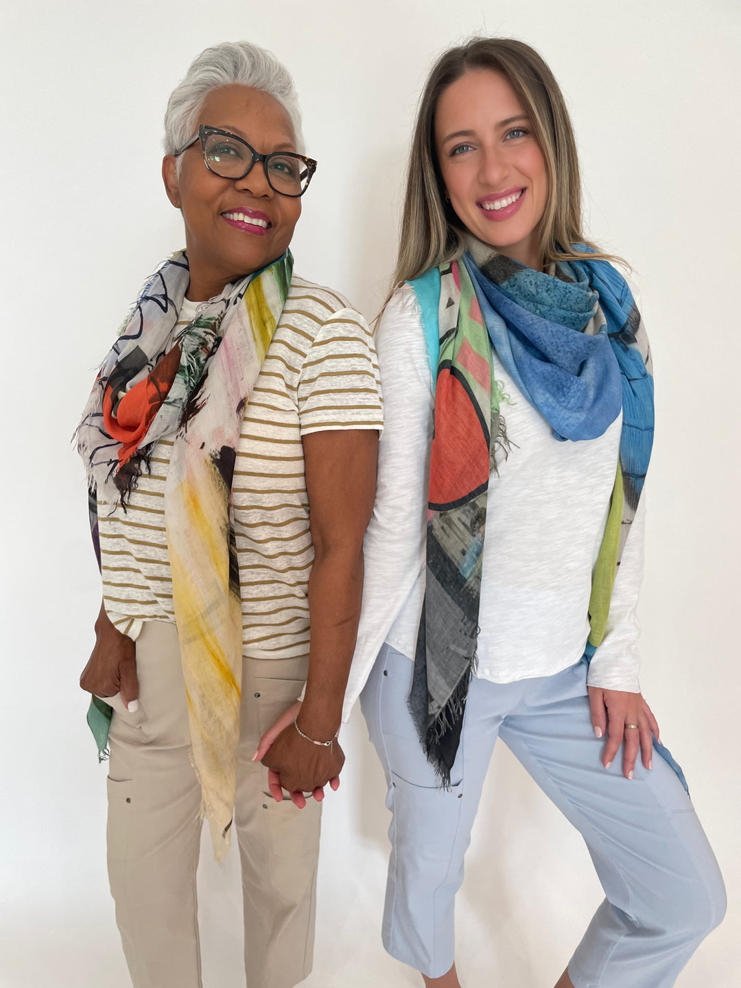 Frame Linen Baby Tee in Dark Khaki paired with Elliott Lauren Crop Cargo Pants in Chino and Elliott Lauren Raw Edge Tee in White paired with Elliott Lauren Crop Cargo Pants in Frost available at Barbara Katz