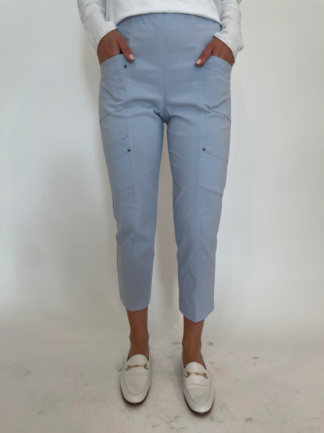 Elliott Lauren Crop Cargo Pants in Frost available at Barbara Katz. Elliott Lauren classic pull-on pants with elastic waistband, cargo pockets, rivet details, straight leg, and cropped length.