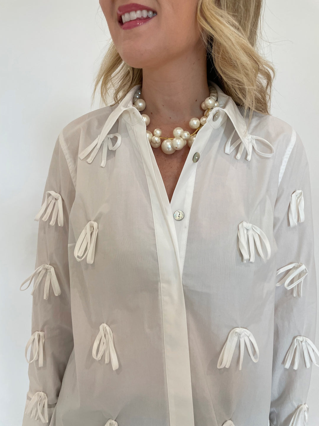 Hope For Flowers Bow Button Down Shirt in White with Vanessa Baroni Multi Beads Collar Necklace in Pearl available at Barbara Katz