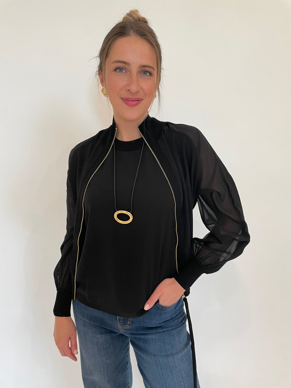 Marella FL VSC Sorona Tank Top in Black layered with Sorona Jacket paired with Frame Le Slim Palazzo Raw After Jeans in Lupine, Ben Amun Adobe Necklace and Madeline Clip-On Link Earrings in Gold available at Barbara Katz