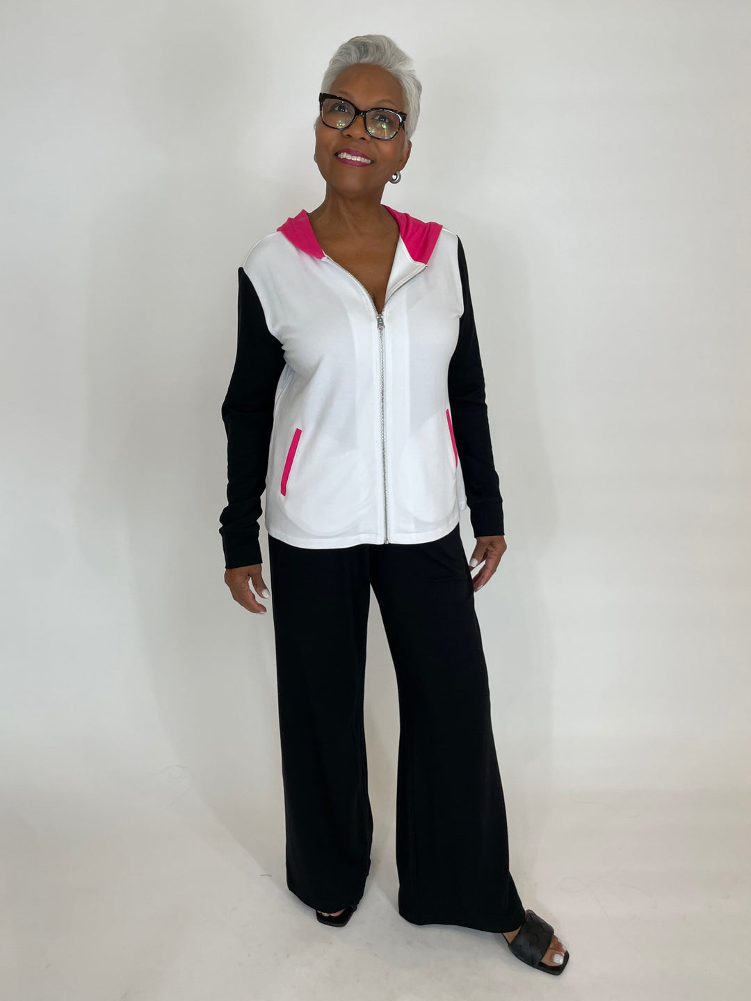 Pure Amici Leni Hoodie in Cerise paired with Pure Amici Lisa Pants in Black available at Barbara Katz