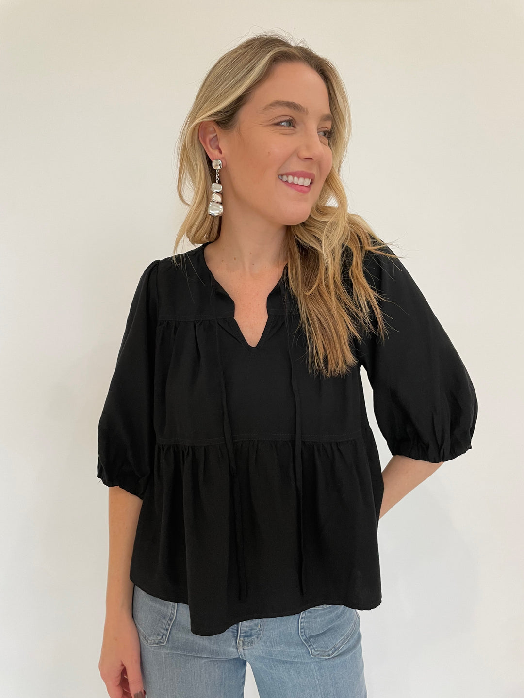 BK Ferlita Elbow Sleeve Blouse in Black with Vanessa Baroni Organic Shaped Earrings in Silver available at Barbara Katz