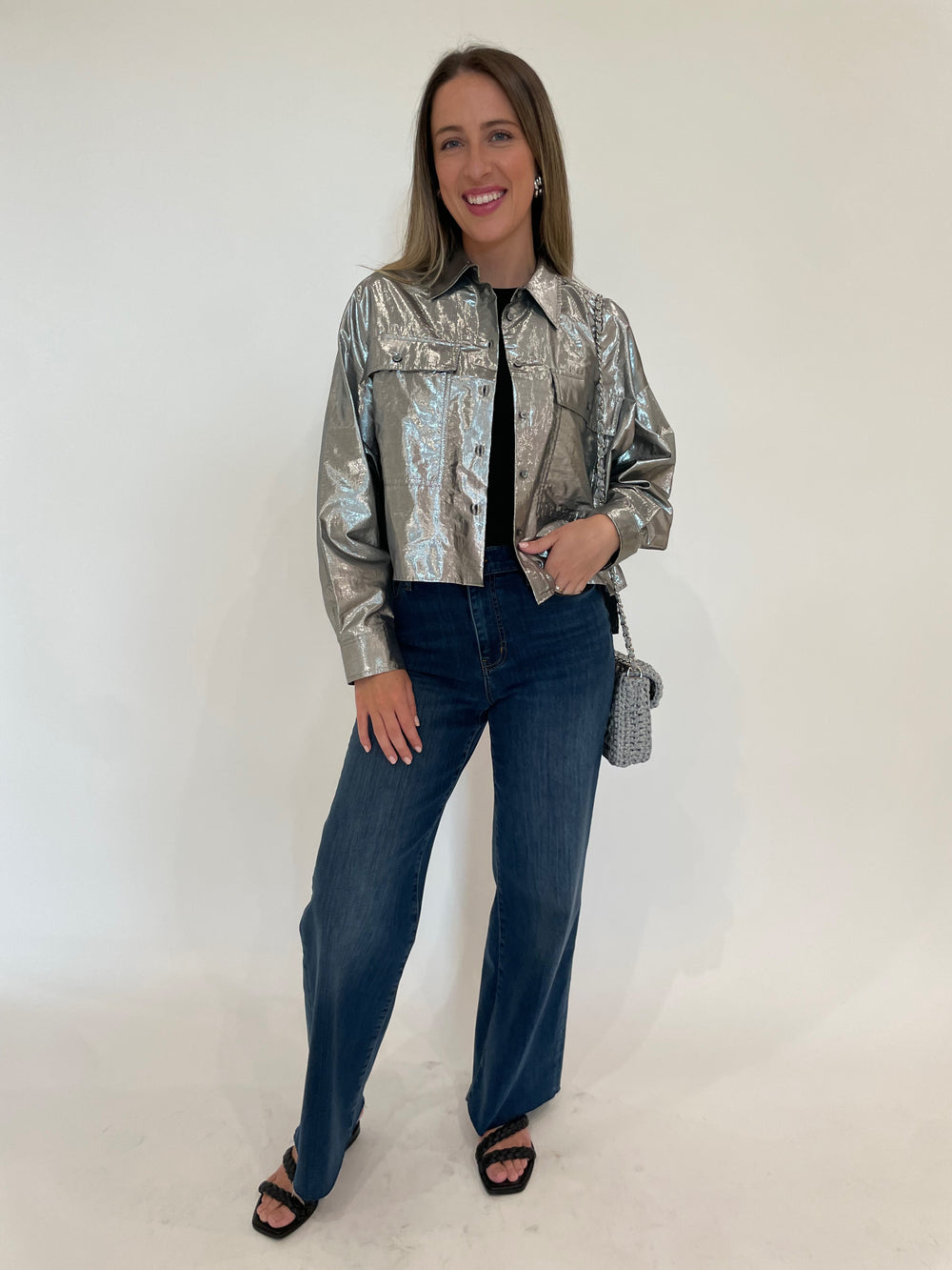 Max Mara Weekend Aldeno Shirt Jacket in Silver paired with Frame Le Slim Palazzo Raw After Jeans in Lupine, Ben Amun Silver Knot Clip-On Earrings, and Lorenza Gandaglia Bagatelle Small Bag in Ghisa Combo available at Barbara Katz