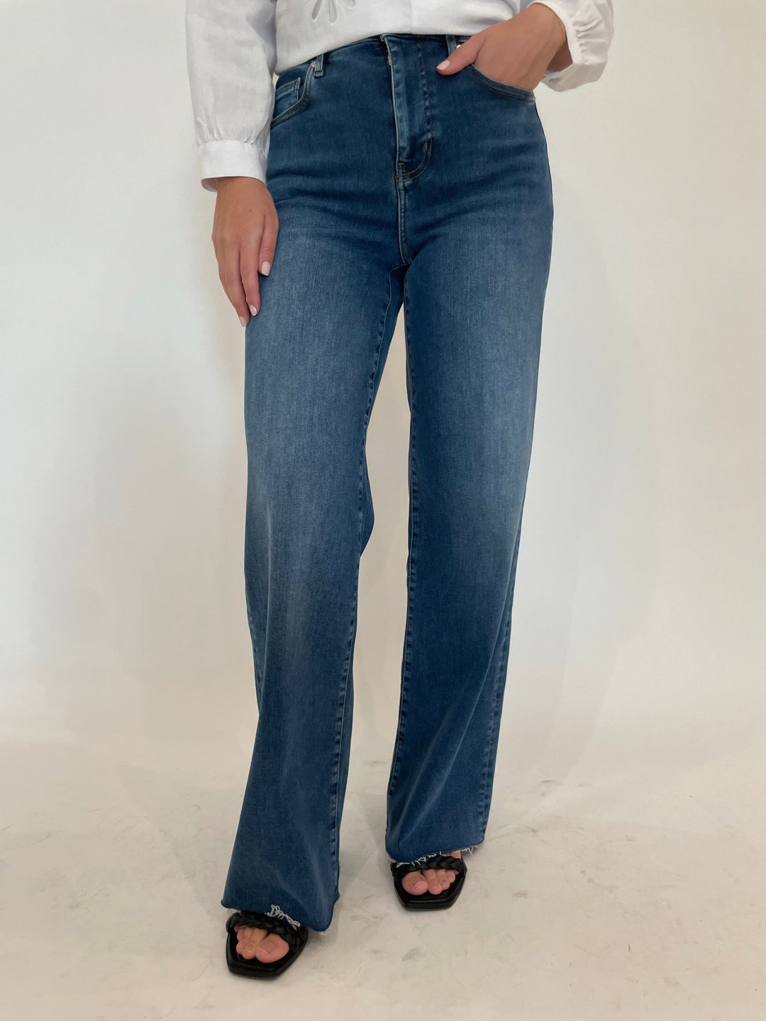 Frame Denim Le Slim Palazzo Raw Fray Jeans in Mermaid available at Barbara Katz