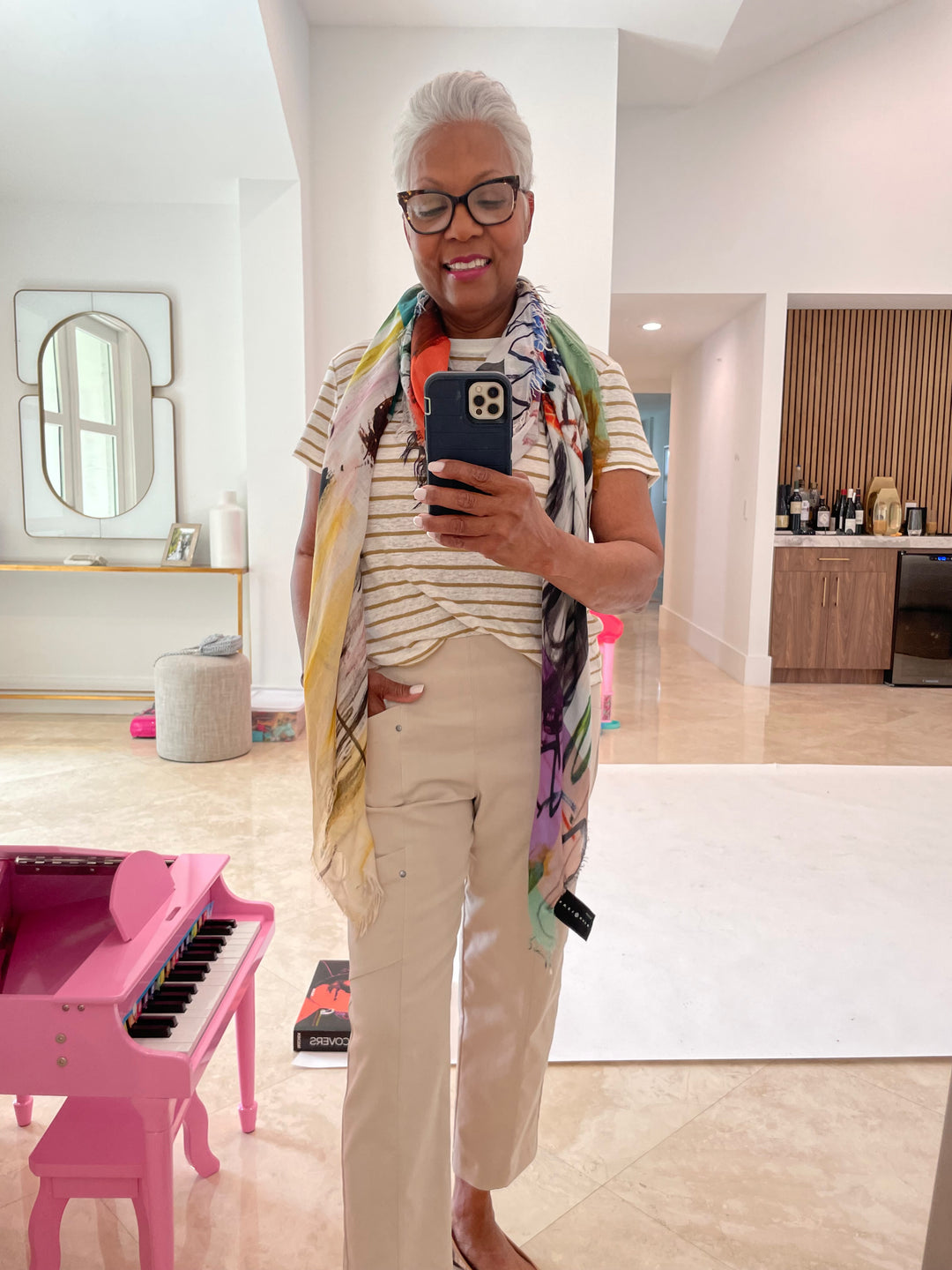 Frame Linen Baby Tee in Dark Khaki with Suzi Roher Resort 2024 Cristina Scarf in Creativity Takes Courage print paired with Elliott Lauren Crop Cargo Pants in Chino available at Barbara Katz