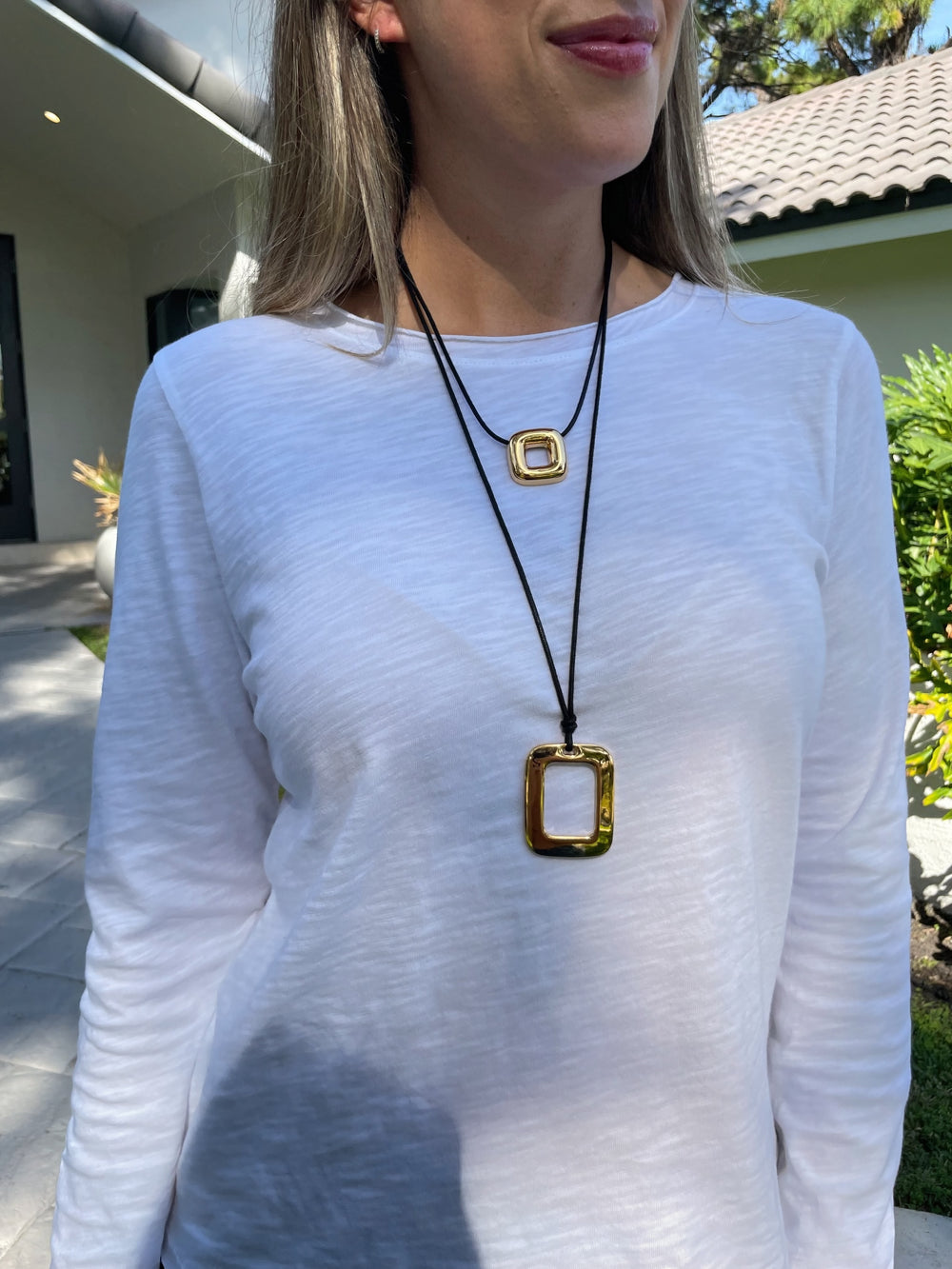 Elliott Lauren Raw Edge Tee in White with Ben Amun Encanto Necklace and Jemez Necklace in Gold available at Barbara Katz