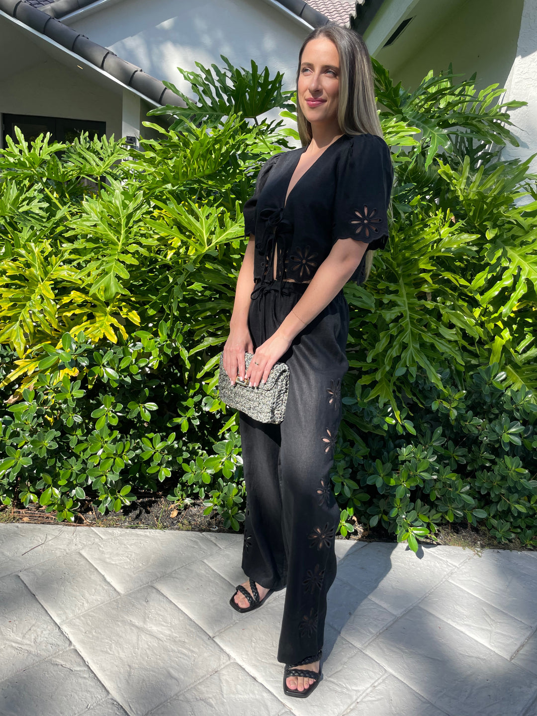 Rails Pari Blouse in Black Eyelet paired with matching Rails Emmie Pants, Lorenza Gandaglia Bagatelle Lurex Bag in Camouflage Combo available at Barbara Katz