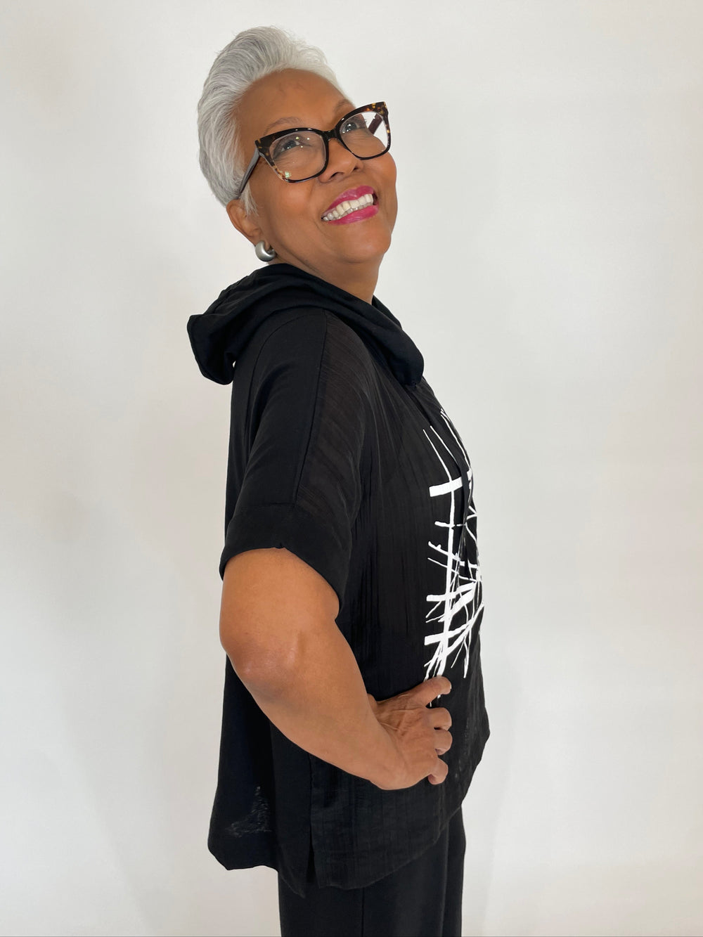 Terra Roxana Short Sleeve Hoodie With Center Graphic in Black available at Barbara Katz