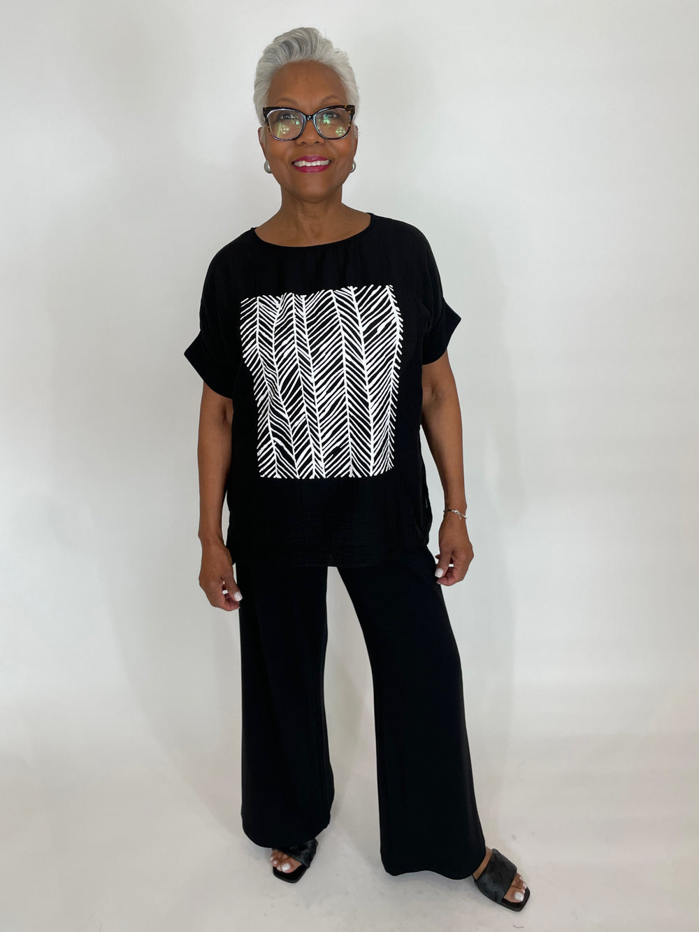 Terra Roxy Graphic Tee in Black paired with Pure Amici Lisa Pants in Black available at Barbara Katz