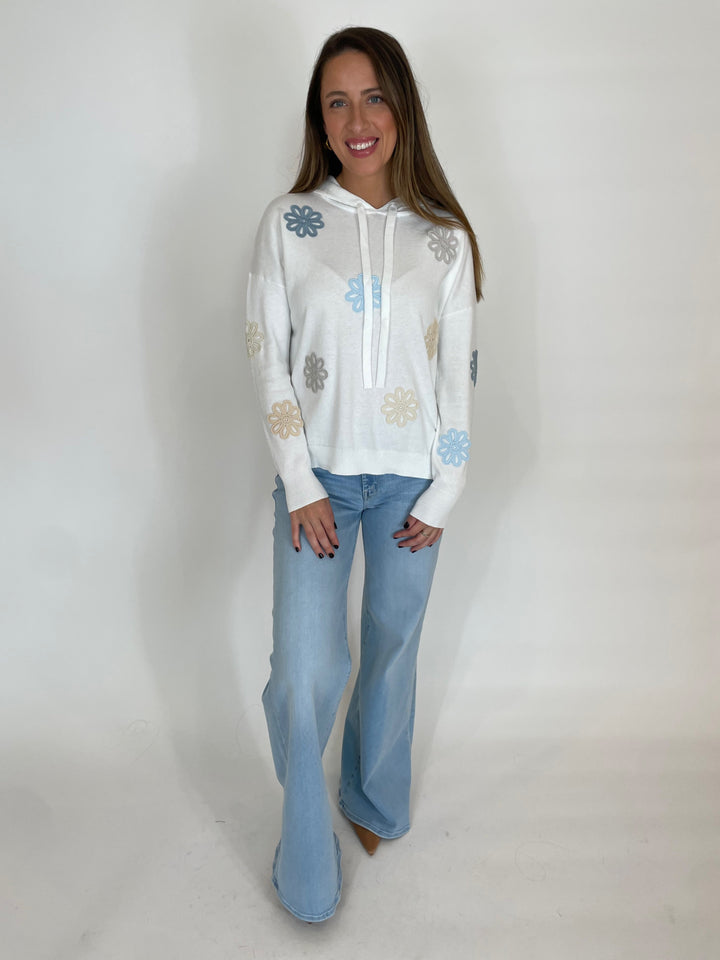 J Society Zami Pastel Floral Hoodie in White paired with Mother The Roller Sneak Jeans in Ball's In Your Court available at Barbara Katz