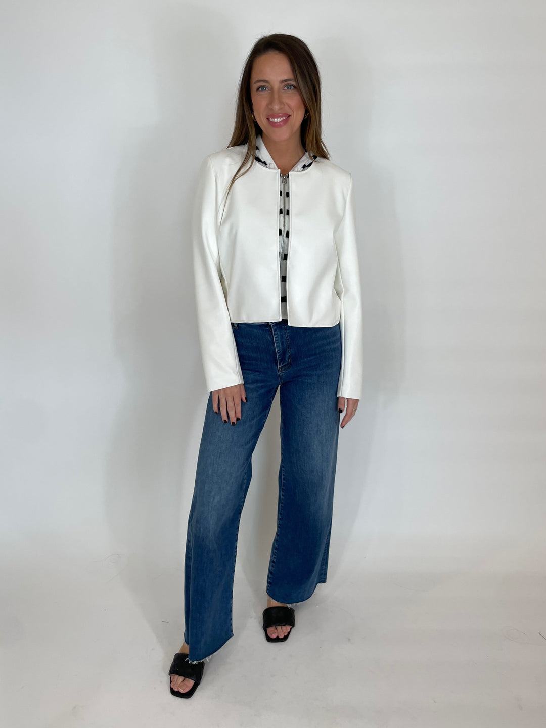 J Society Alexia Jacket in White paired with Frame Le Slim Palazzo Raw After Jeans in Lupine available at Barbara Katz