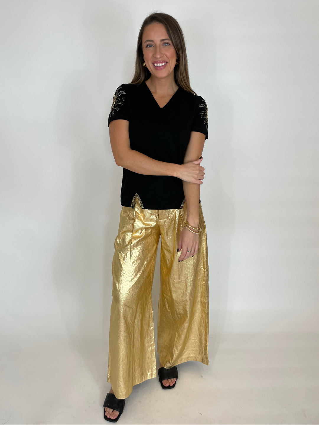 Leo & Ugo Moon & Sun Beaded Tee in Black paired with Lanhtropy Foiled Linen Culotte Pants in Gold, Dean Davidson Gold Crosby Hinged Bangle and Mirabeau Pave Bracelet in White Topaz/Gold with available at Barbara Katz