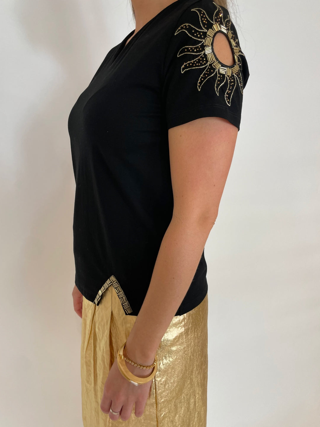 Leo & Ugo Moon & Sun Beaded Tee in Black paired with Lanhtropy Foiled Linen Culotte Pants in Gold with available at Barbara Katz