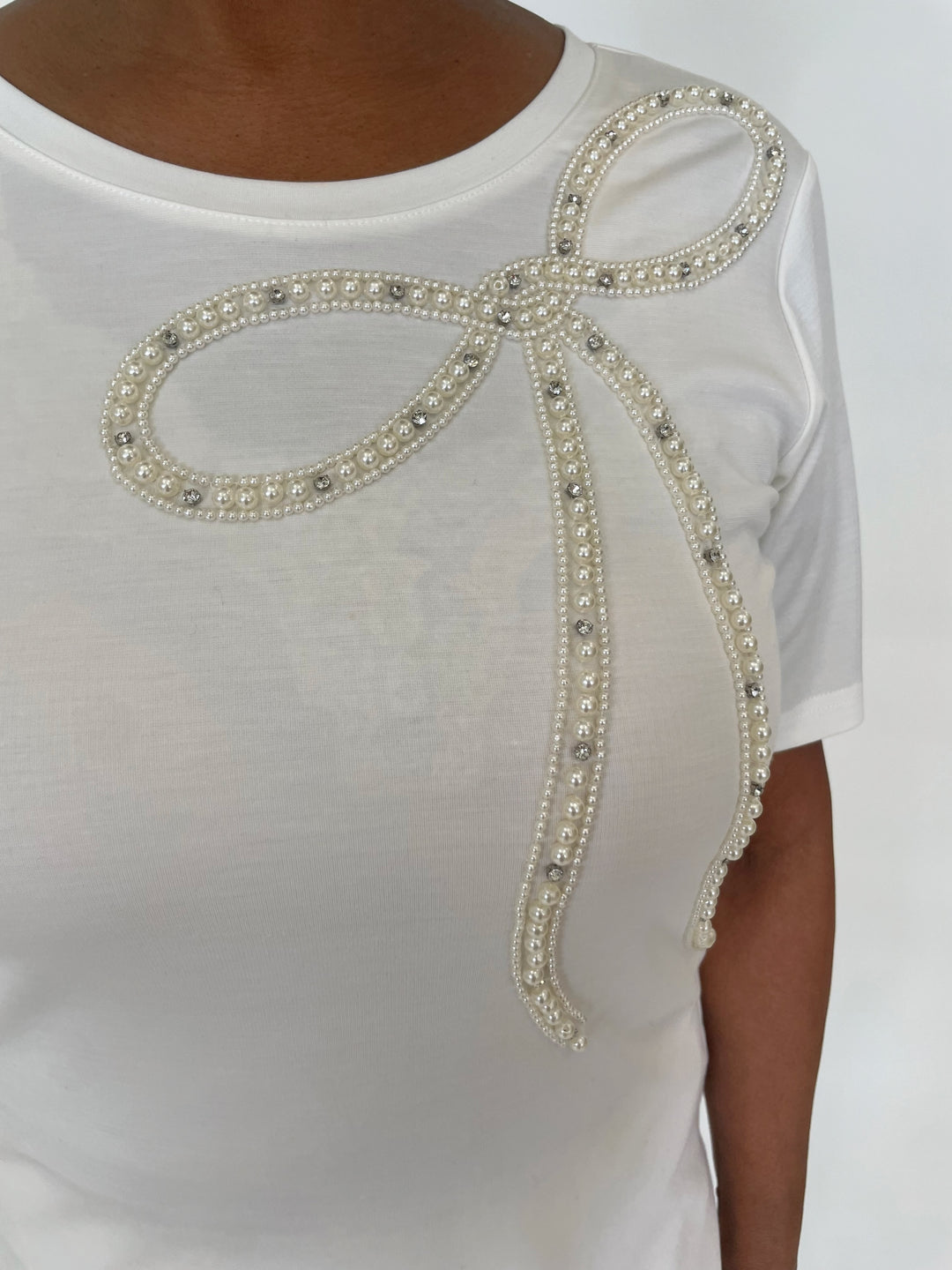 Leo & Ugo Tanya Pearl Bow Tee in White available at Barbara Katz