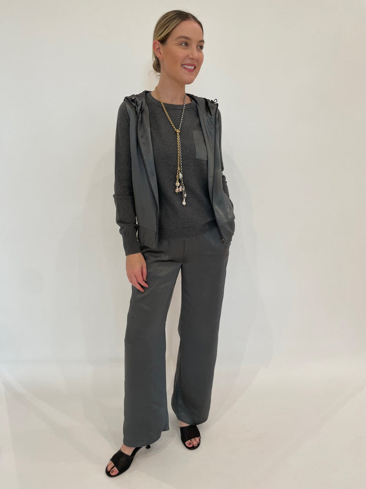 J Society Celeste Satin Hoodie Vest in Gunmetal with Jette Satin Pocket Sweatshirt underneath, paired with matching J Society Jesse Satin Pants in Gunmetal, Suzy T Pearl Lariat Necklace in Gold/Silver available at Barbara Katz