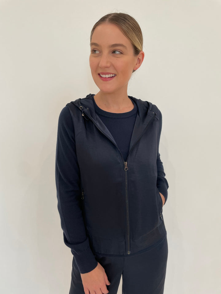 J Society Celeste Satin Hoodie Vest in Navy with Jette Satin Pocket Sweatshirt underneath available at Barbara Katz