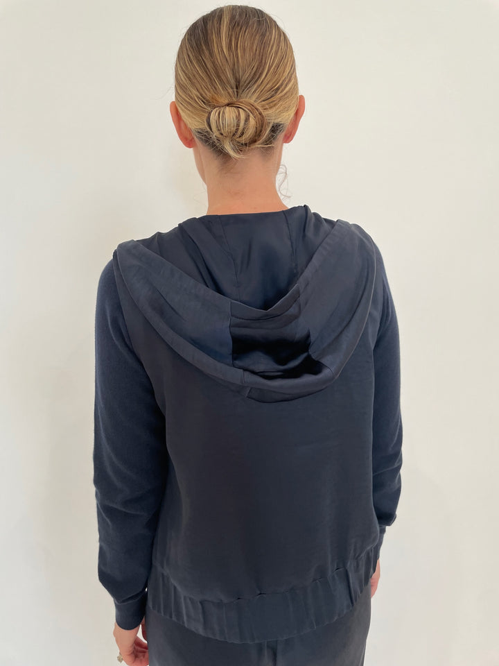 J Society Celeste Satin Hoodie Vest in Navy with Jette Satin Pocket Sweatshirt underneath available at Barbara Katz