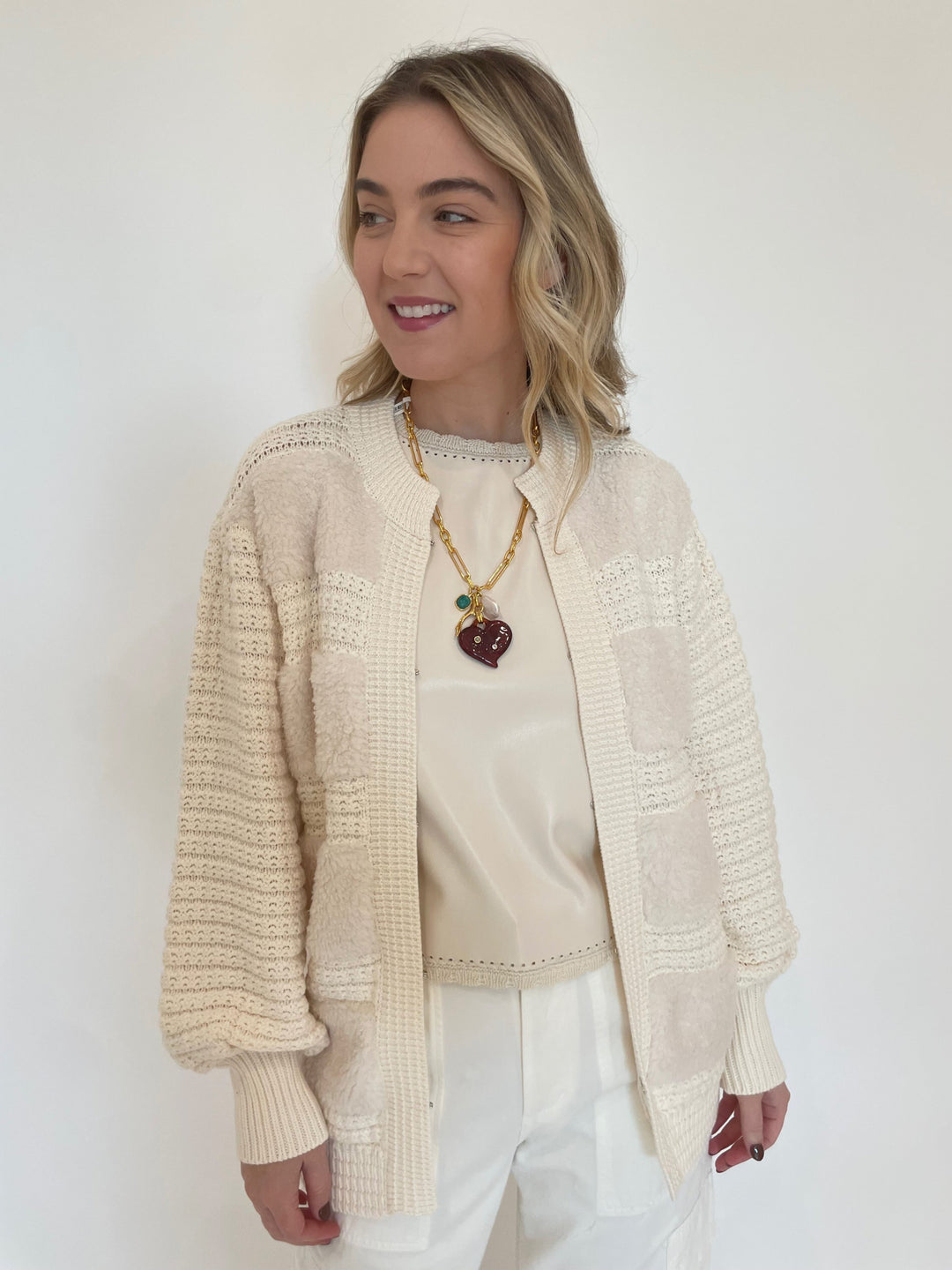 Melissa Nepton Romeo Fuzzy Crochet Cardigan in Cream with Cece Vegan Leather Sleeveless Top underneath, Lizzie Fortunato Murano Heart Necklace available at Barbara Katz