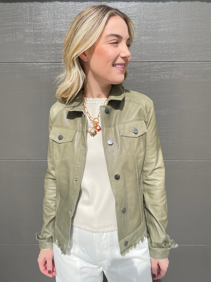 Melissa Nepton Cece Vegan Leather Sleeveless Top in Cream layered with Jakett Alexa Patina Leather Jacket in Army, Lizzie Fortunato Helios Charm Necklace available at Barbara Katz