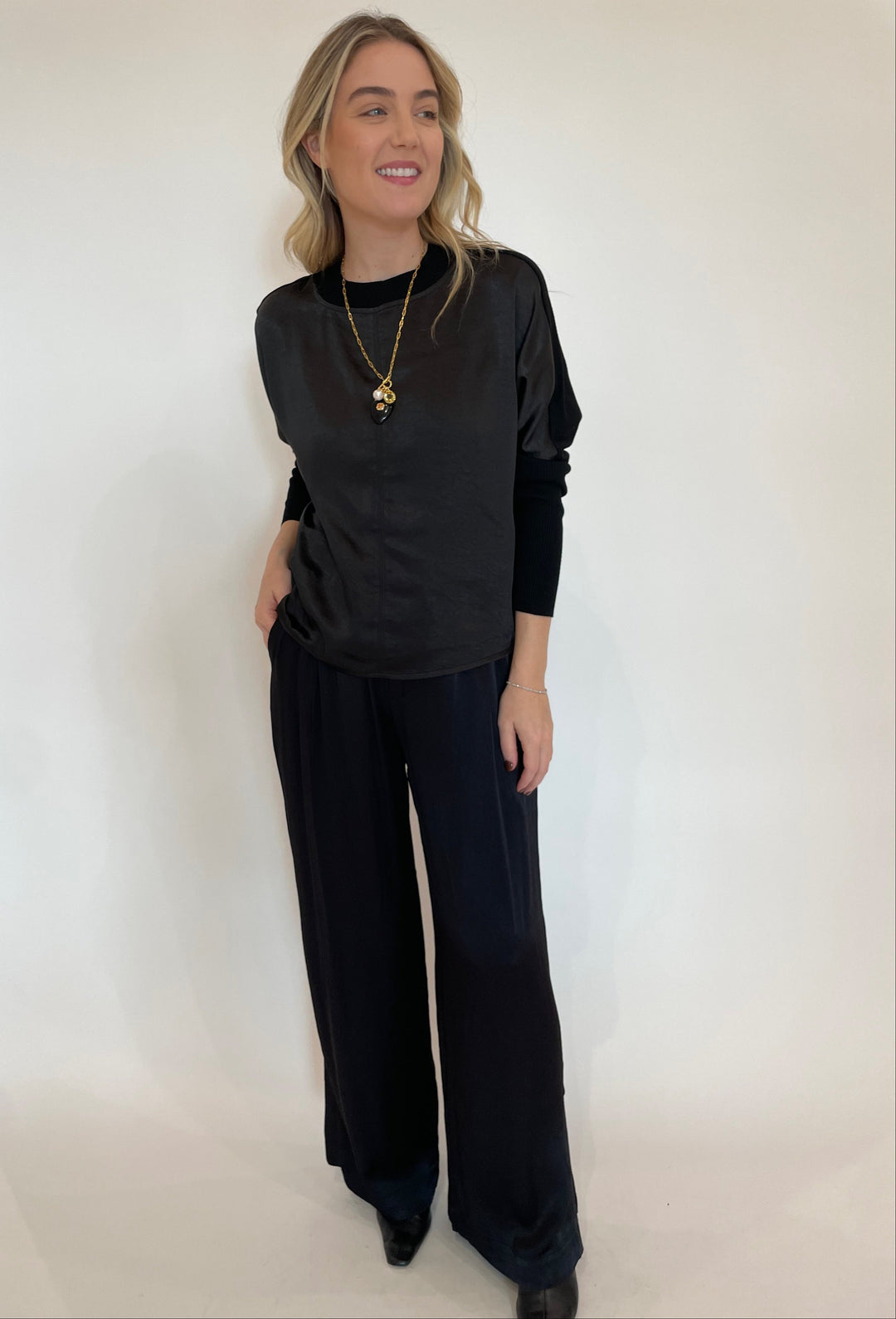 Melissa Nepton Noa Satin Combo Top in Black paired with Lorene Satin Wide Leg Pants in Black, Lizzie Fortunato Eugenia Heart Lariat Necklace available at Barbara Katz