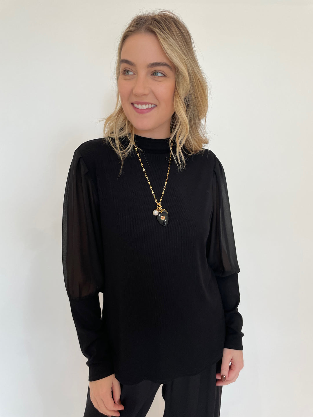 Melissa Nepton Melody Sheer Sleeve Top in Black with Lizzie Fortunato Eugenia Heart Lariat Necklace available at Barbara Katz