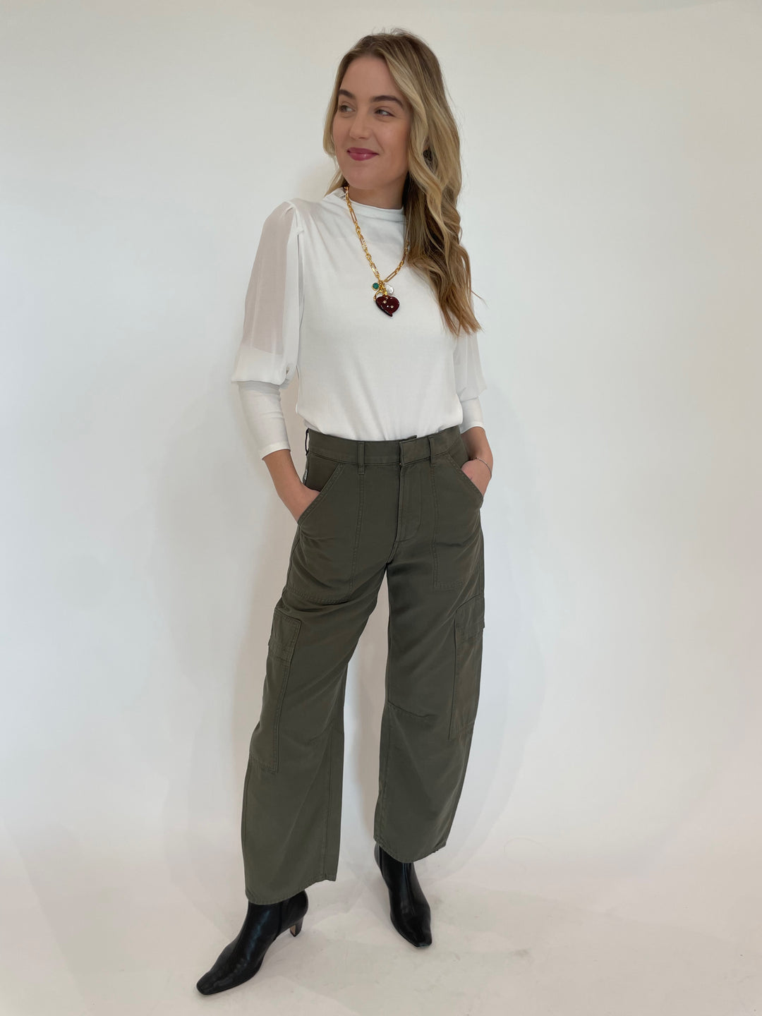 Melissa Nepton Melody Sheer Sleeve Top in Off White paired with Citizens of Humanity Marcelle Low Slung Easy Cargo Pants in Dogwood, Lizzie Fortunato Murano Heart Necklace - all available at Barbara Katz