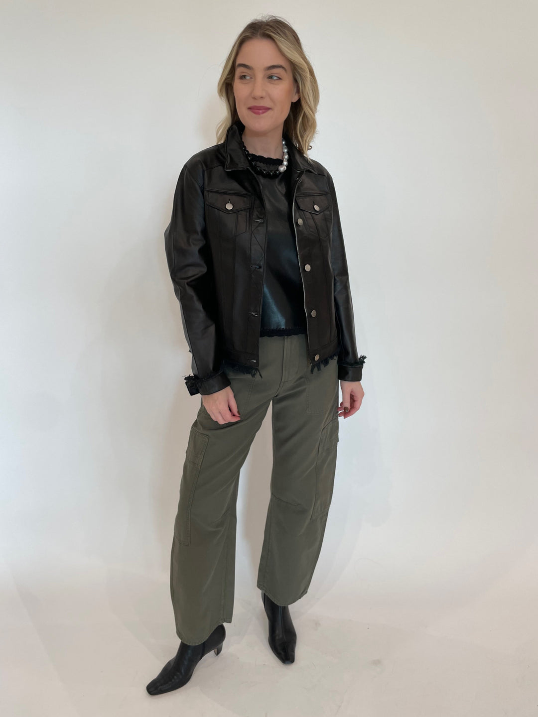 Melissa Nepton Cece Vegan Leather Sleeveless Top in Black layered with BK Alexa Patina Leather Jacket in Black, paired with Citizens of Humanity Marcelle Low Slung Easy Cargo Pants in Dogwood, Lizzie Fortunato Midnight Sky Collar Necklace - all available at Barbara Katz