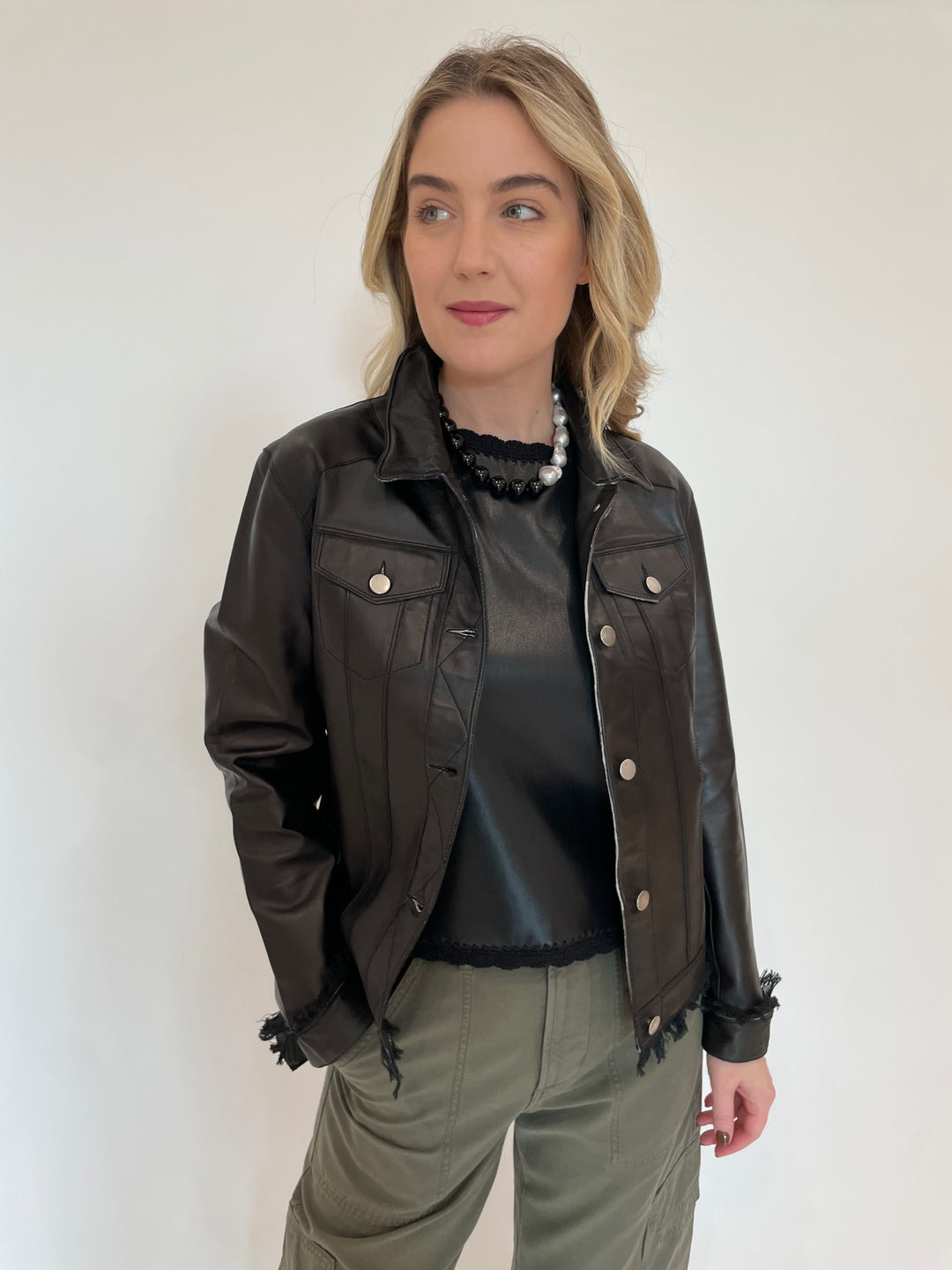 Jakett Alexa Patina Leather Jacket in Black with Melissa Nepton Cece Vegan Leather Sleeveless Top underneath, Lizzie Fortunato Midnight Sky Collar Necklace available at Barbara Katz