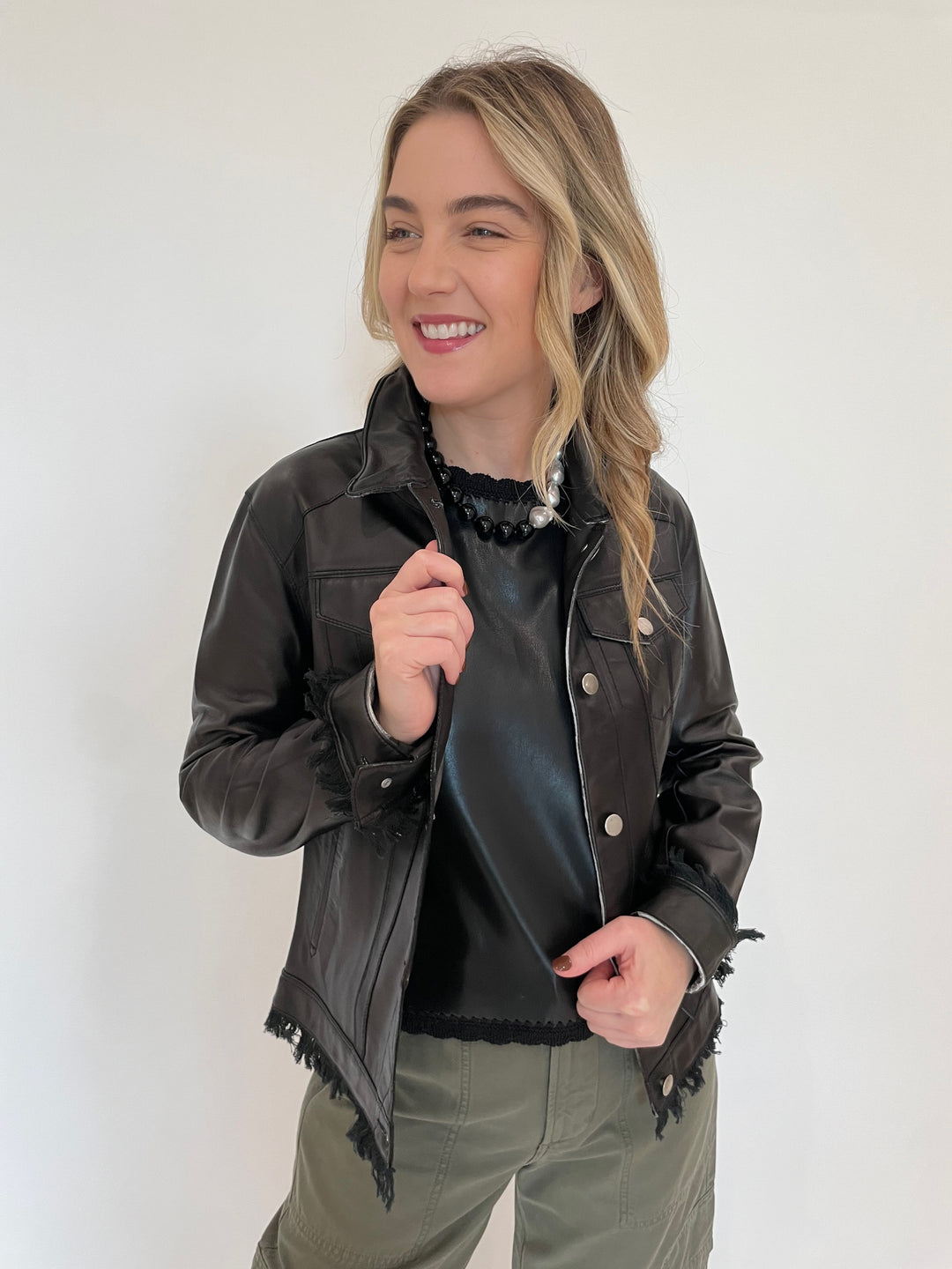 Jakett Alexa Patina Leather Jacket in Black with Melissa Nepton Black Cece Vegan Leather Sleeveless Top underneath, Lizzie Fortunato Midnight Sky Collar Necklace available at Barbara Katz