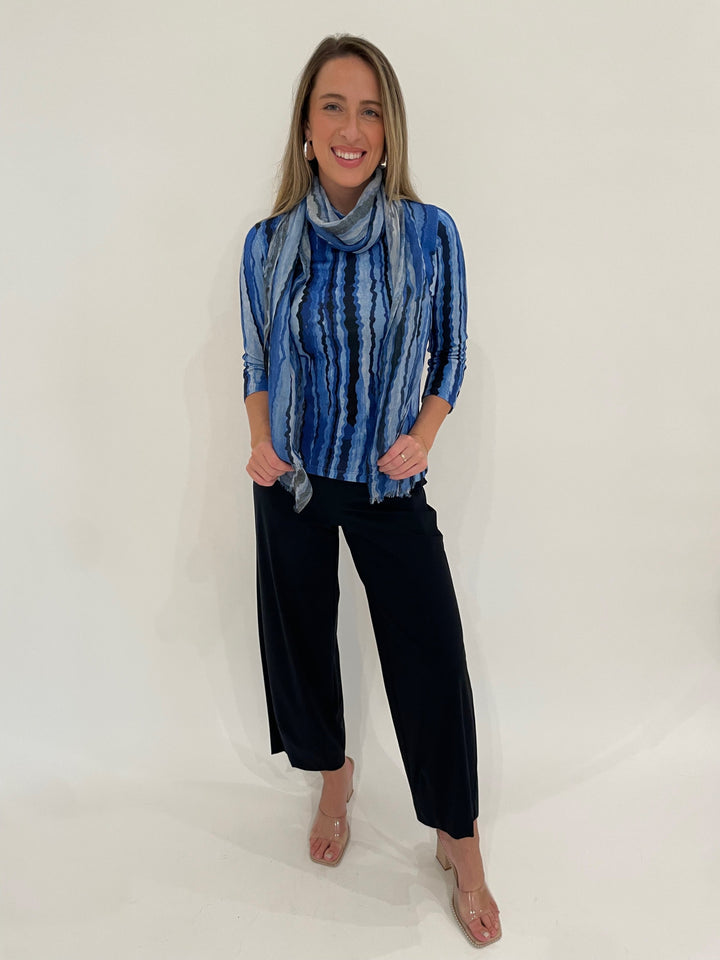 Pashma Contoured Bamboo Silk Lines T-Shirt in Blue with Contoured Lines Scarf, paired with Raffaello Rossi 7/8 Sally Pants in Marine, BK Bianca Puffy Triangle Open Hoop Earrings in Silver - all available at Barbara Katz