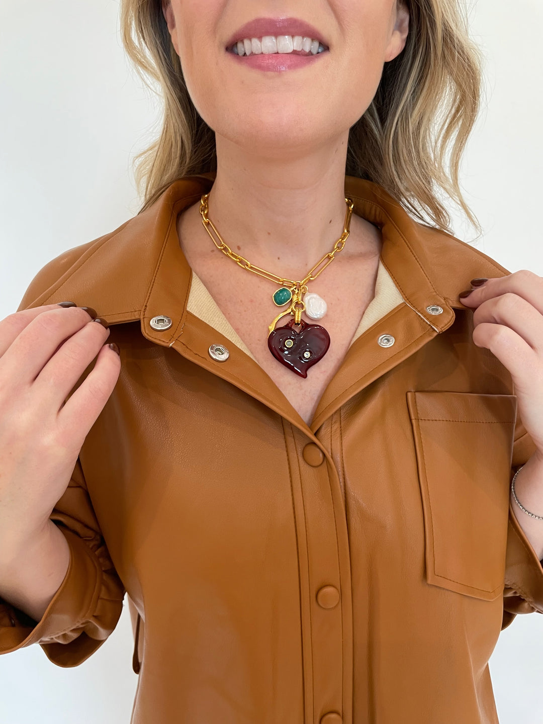 BK Sierra Vegan Leather Belted Dress in Burnt Orange with Lizzie Fortunato Murano Heart Necklace available at Barbara Katz