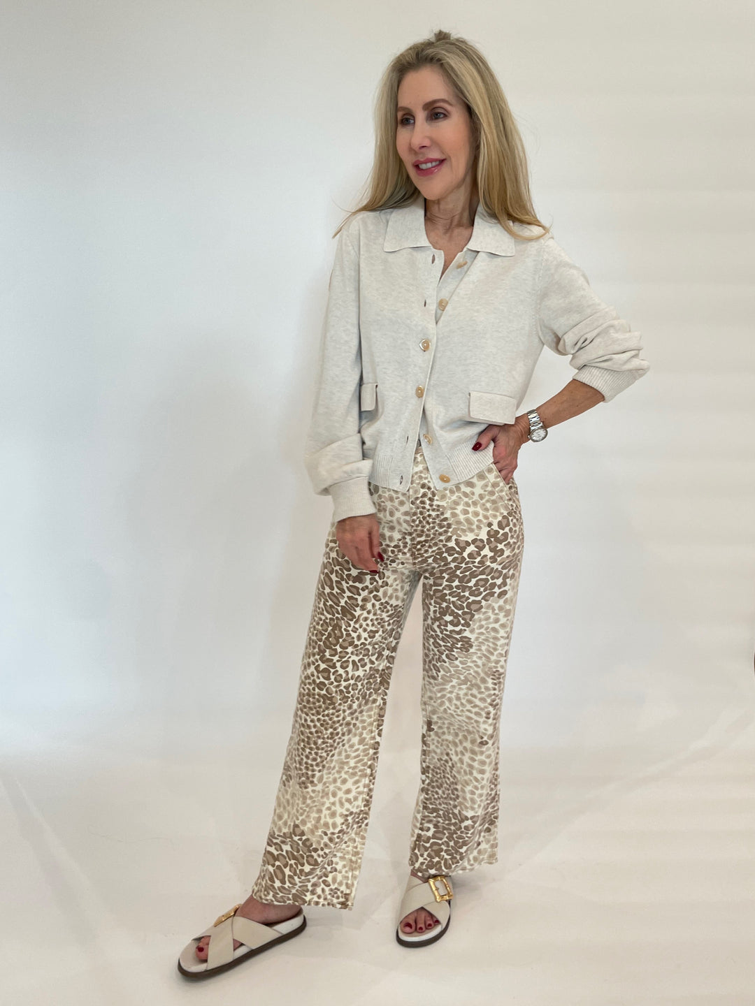 Repeat Cashmere Cotton Viscose Cardigan in Ivory paired with Mother Denim The Major Zip Ankle Pants in Spot On Leopard print available at Barbara Katz