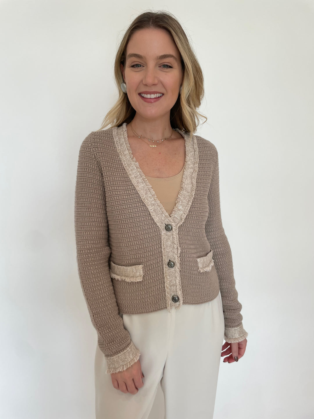 Autumn Cashmere Fringed Trimmed V-Neck Jacket in Sandalwood Combo paired with Peace of Cloth Jules Paramount Knit Pants in Oyster, Pono Mollie Barile Clip Earrings in Silver available at Barbara Katz