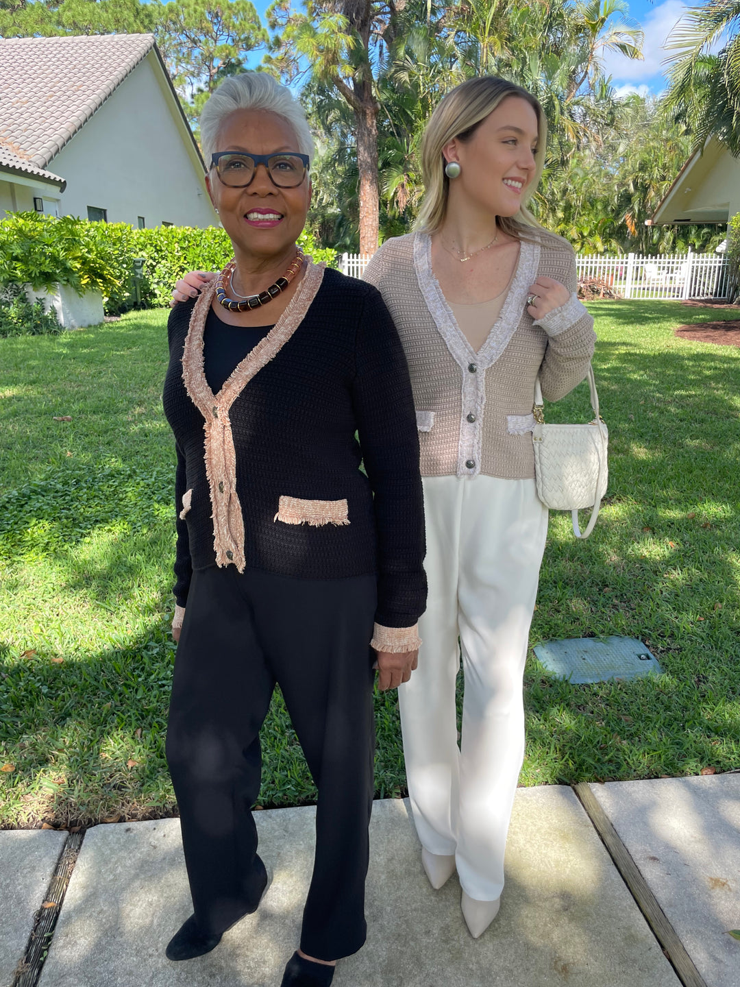 Autumn Cashmere Fringed Trimmed V-Neck Jacket in Black Combo paired with Peace of Cloth Jules Paramount Knit Pants in Black, Autumn Cashmere Fringed Trimmed V-Neck Jacket in Sandalwood Combo paired with Peace of Cloth Jules Paramount Knit Pants in Oyster available at Barbara Katz