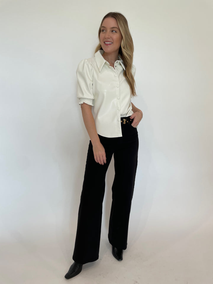 BK Senna Vegan Leather Puff Sleeve Top in White paired with Frame Le Slim Palazzo Wide Leg Jeans in Black, B-Low the Belt Juniper Studded Leather Belt in Black Gold available at Barbara Katz