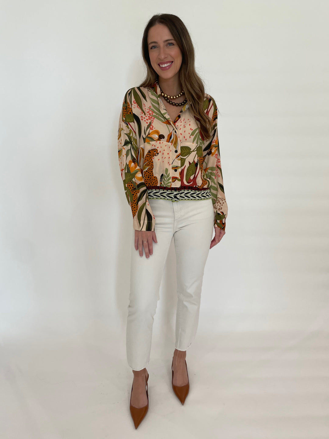 Aldomartins Saray Jungle Print Blouse paired with White Jeans available at Barbara Katz