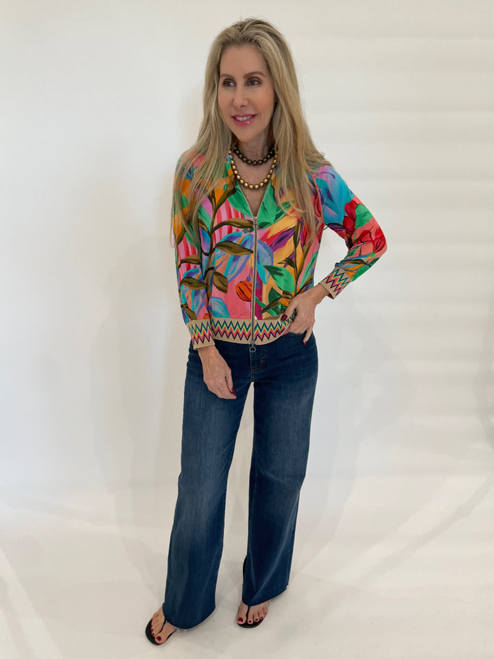 Aldomartins Lydia Tropical Print Blouse paired with Frame Denim Le Slim Palazzo Raw After Jeans in Lupine available at Barbara Katz